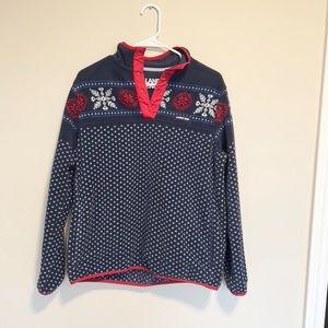 Lands’ End Blue Quarter Button Up Fleece With Snowflake and red trim.